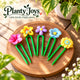 Planty Joys Flower Series set of five decorative indoor plant stem supports with colourful flower designs, displayed on a wooden tray